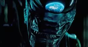 A close up of a xenomorph with Earth reflected on its head in the Alien: Earth TV show teaser